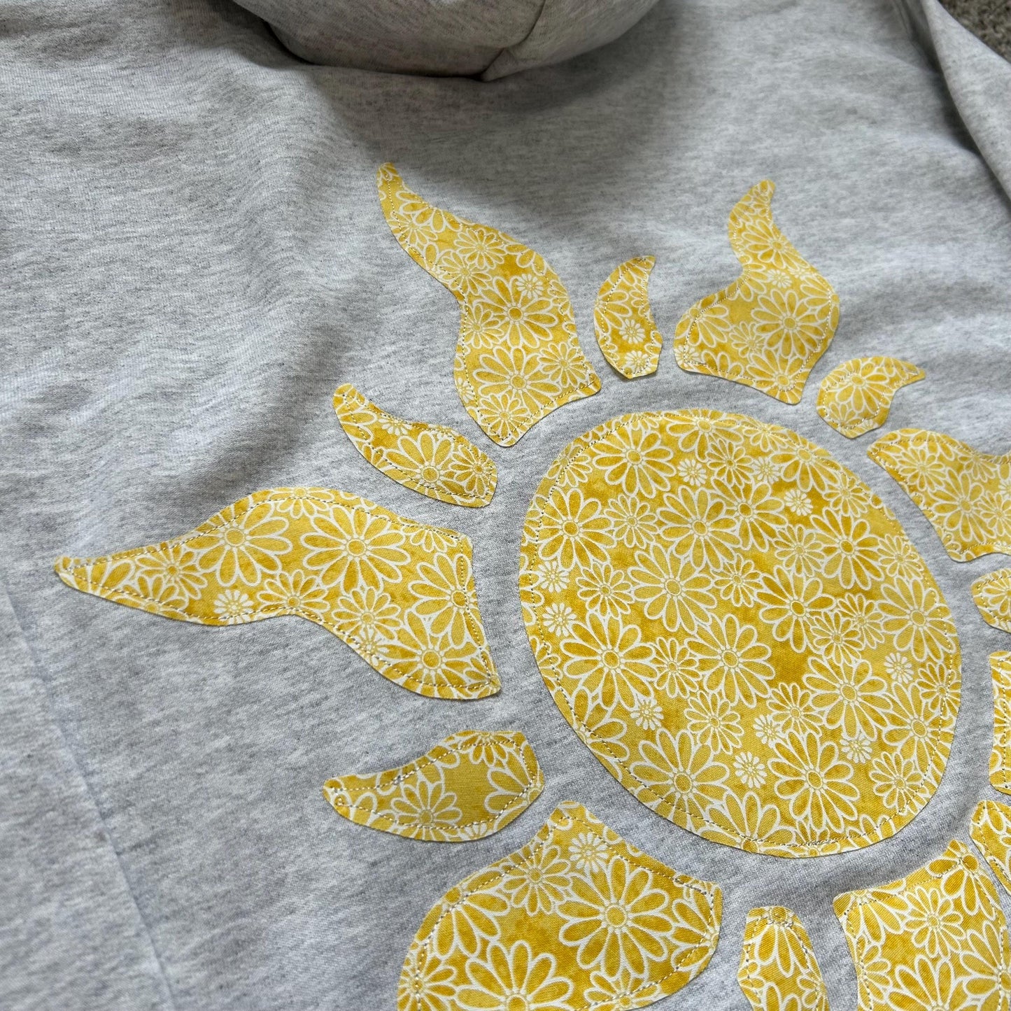 Tangled Sun Fabric-Sewn Hoodie: Yellow Flower Appliqué